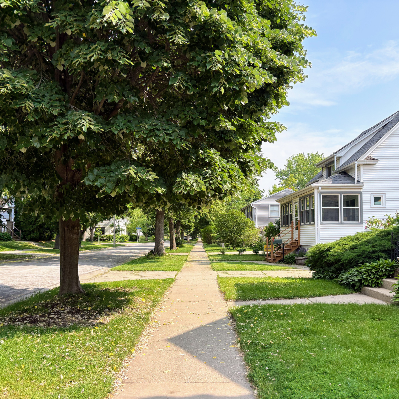 View of midwest neighborhood from sidewalk