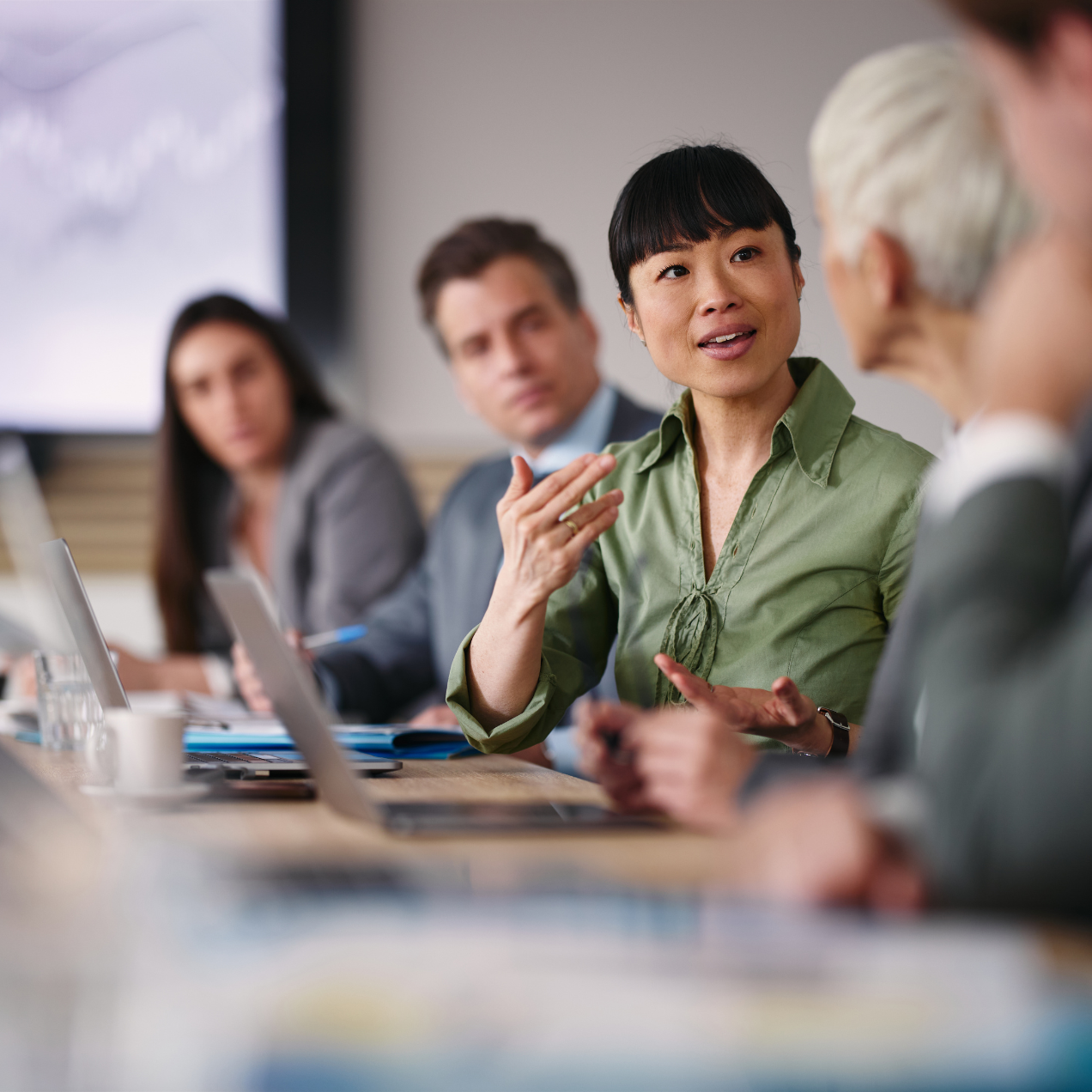 Woman speaking in meeting