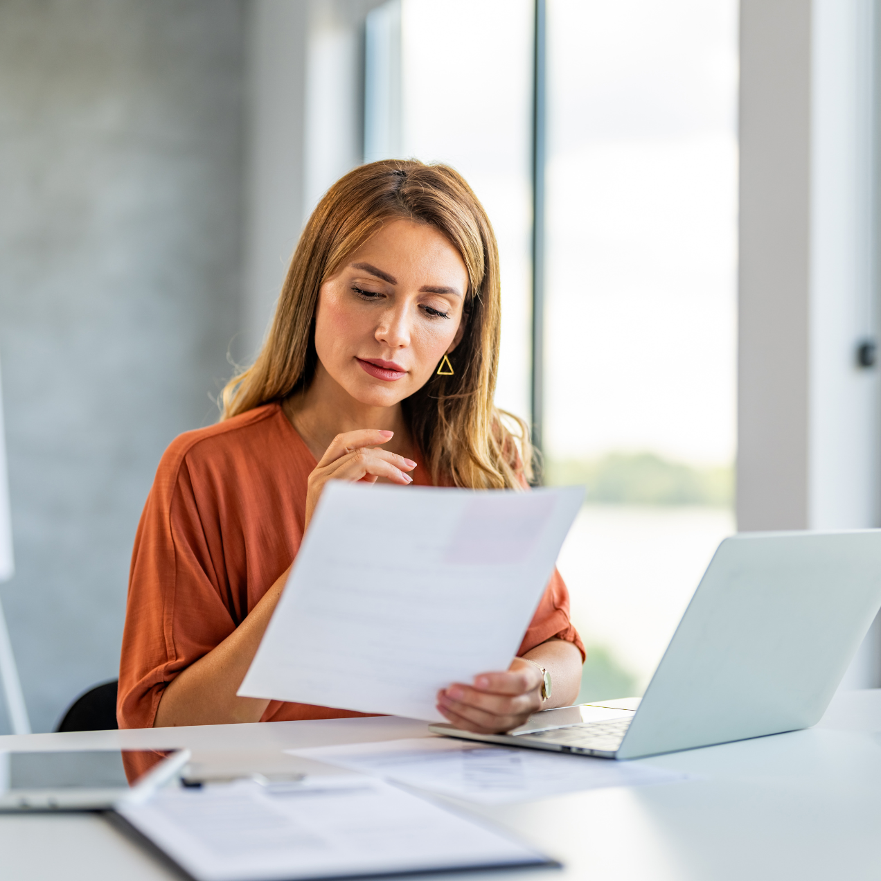 Woman looking at paper